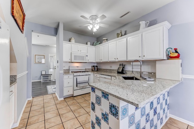 353 Evening Star Ct Unit 353, Bolingbrook, IL 60440 - kitchen with white appliances, a sink, a peninsula, ceiling fan, and white cabinets