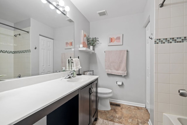 2530 Oneida Ln Unit 2530, Naperville, IL 60563 - full bathroom featuring baseboards, toilet, vanity,  shower combination, and stone finish floors