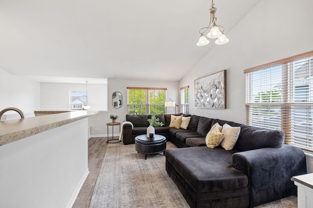 2530 Oneida Ln Unit 2530, Naperville, IL 60563 - living room featuring light wood finished floors, baseboards, and high vaulted ceiling