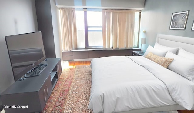 6030 N Sheridan Rd Unit 404, Chicago, IL 60660 - bedroom with wood finished floors