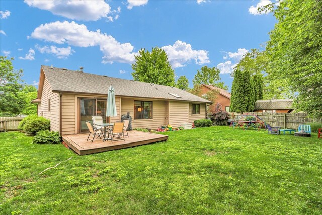 2805 Susan Stone Dr, Urbana, IL 61802 - rear view of property featuring a deck and roof with shingles