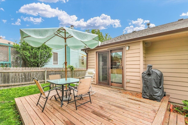 2805 Susan Stone Dr, Urbana, IL 61802 - deck with outdoor dining space and a grill