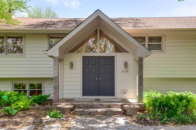 6316 Lake Shore Dr, Cary, IL 60013 - view of exterior entry with roof with shingles