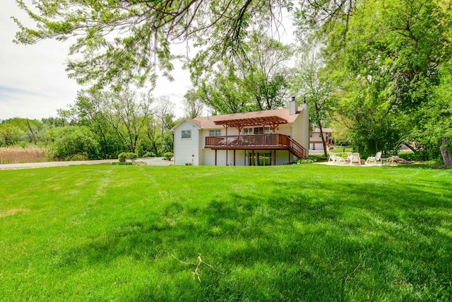 6316 Lake Shore Dr, Cary, IL 60013 - view of grassy yard featuring a wooden deck and stairway