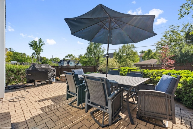4532 Douglas Rd, Downers Grove, IL 60515 - fenced backyard with outdoor dining area, a patio, and area for grilling