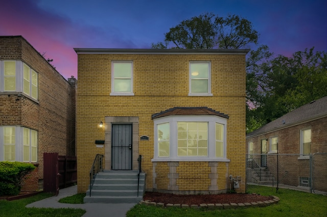 12137 S Perry Ave, Chicago, IL 60628 - view of front facade featuring brick siding