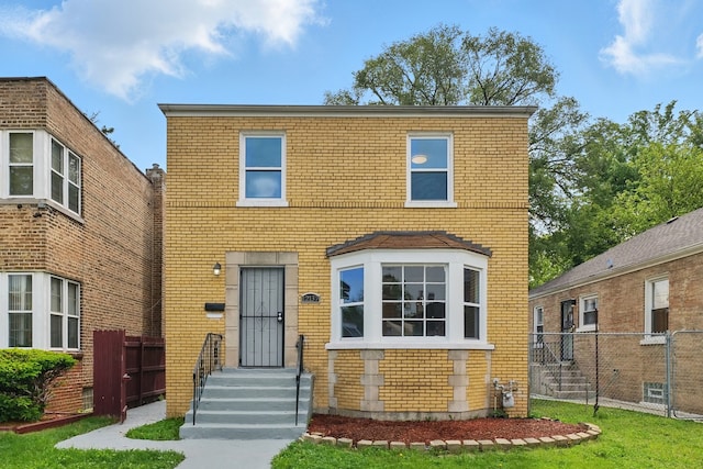 12137 S Perry Ave, Chicago, IL 60628 - view of front of house featuring brick siding