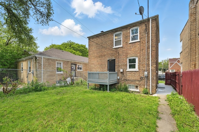 12137 S Perry Ave, Chicago, IL 60628 - rear view of property with brick siding
