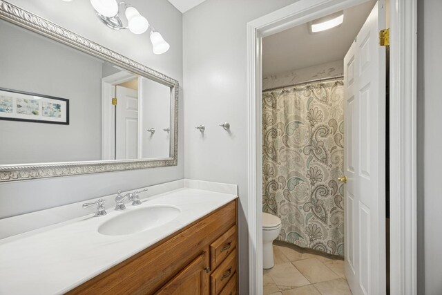 2618 Smith St, Rolling Meadows, IL 60008 - bathroom featuring toilet, vanity, tile patterned flooring, and a shower with curtain