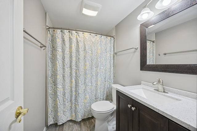 2618 Smith St, Rolling Meadows, IL 60008 - full bathroom featuring toilet, wood finished floors, vanity, and a shower with shower curtain