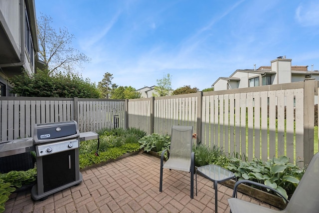2618 Smith St, Rolling Meadows, IL 60008 - view of patio with grilling area and a fenced backyard