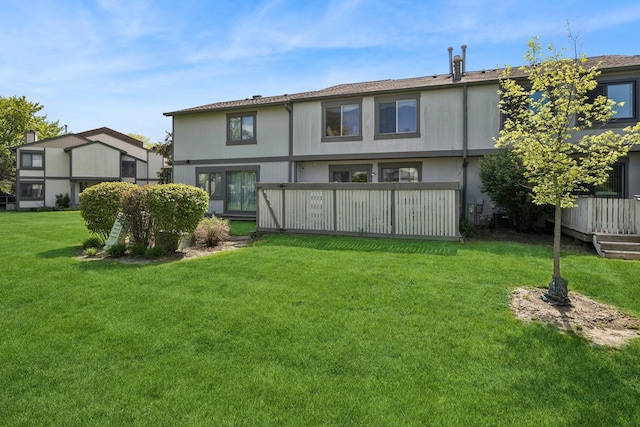 2618 Smith St, Rolling Meadows, IL 60008 - rear view of property with a yard
