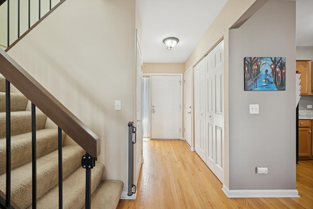 2618 Smith St, Rolling Meadows, IL 60008 - entrance foyer featuring light wood-style floors, baseboards, and stairs