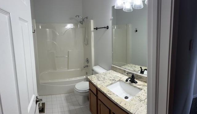 bathroom with toilet, tile patterned floors, vanity, and washtub / shower combination
