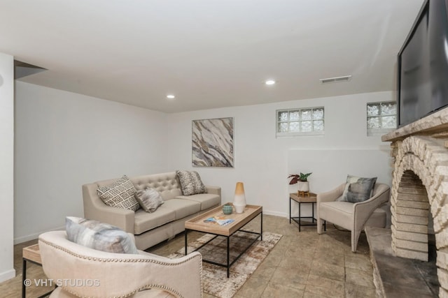 7912 W Lawrence Ave Unit C, Norridge, IL 60706 - living room featuring recessed lighting, a fireplace, and baseboards