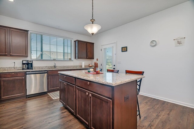 25626 S Geraldine Ct, Channahon, IL 60410 - kitchen with stainless steel dishwasher, plenty of natural light, dark wood-type flooring, and a center island