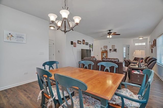 25626 S Geraldine Ct, Channahon, IL 60410 - dining space with dark wood-style flooring, ceiling fan, a chandelier, and baseboards
