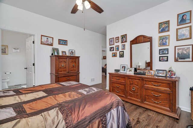 25626 S Geraldine Ct, Channahon, IL 60410 - bedroom with dark wood finished floors, baseboards, and ensuite bathroom