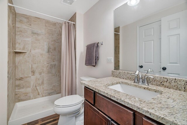 25626 S Geraldine Ct, Channahon, IL 60410 - bathroom featuring toilet, a stall shower, and vanity