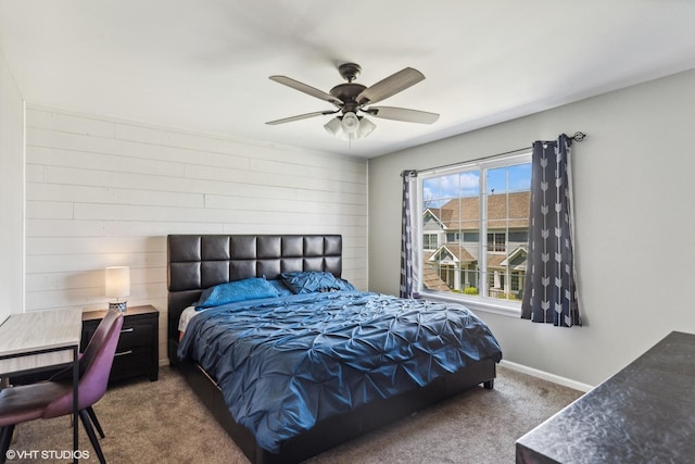 39642 N Warren Ln Unit 0, Beach Park, IL 60083 - carpeted bedroom featuring a ceiling fan, wooden walls, and baseboards