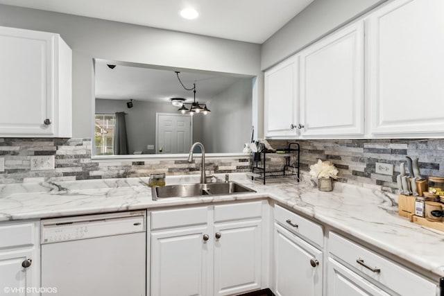 39642 N Warren Ln Unit 0, Beach Park, IL 60083 - kitchen featuring white dishwasher, a sink, backsplash, white cabinets, and recessed lighting