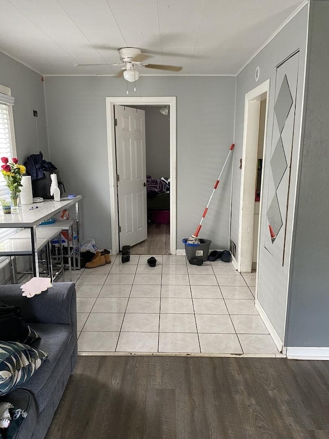 14735 Myrtle Ave, Harvey, IL 60426 - living area with light wood-style flooring, a ceiling fan, and ornamental molding