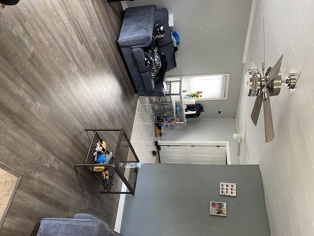 14735 Myrtle Ave, Harvey, IL 60426 - living area featuring tile walls