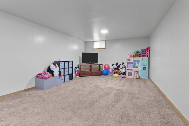 game room featuring carpet floors and baseboards