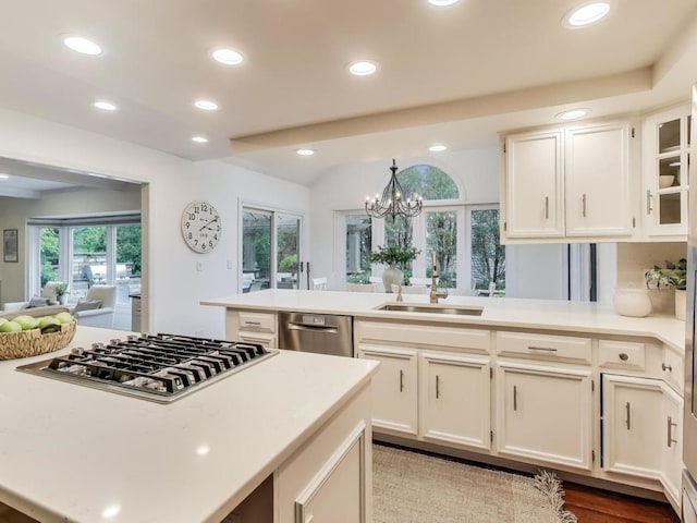 1664 Imperial Cir, Naperville, IL 60563 - kitchen with a sink, appliances with stainless steel finishes, a peninsula, light countertops, and recessed lighting