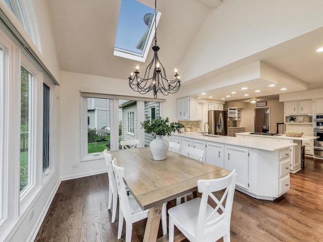 1664 Imperial Cir, Naperville, IL 60563 - dining room featuring a chandelier, dark wood-style floors, high vaulted ceiling, and recessed lighting