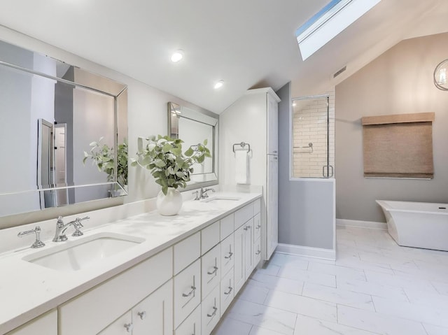 1664 Imperial Cir, Naperville, IL 60563 - bathroom with vaulted ceiling, a shower stall, double vanity, a skylight, and a freestanding bath