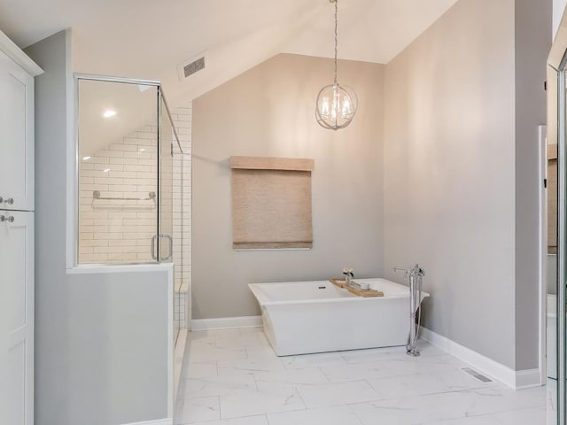 1664 Imperial Cir, Naperville, IL 60563 - full bathroom with marble finish floors, a soaking tub, a shower stall, lofted ceiling, and a chandelier