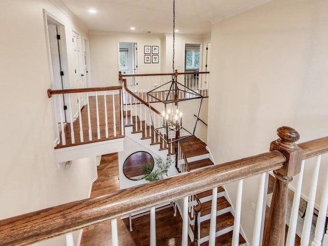 1664 Imperial Cir, Naperville, IL 60563 - staircase with ornamental molding, a chandelier, and wood finished floors