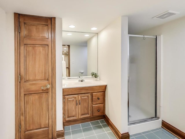 1664 Imperial Cir, Naperville, IL 60563 - bathroom featuring a stall shower, vanity, baseboards, tile patterned flooring, and recessed lighting
