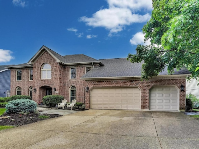 1664 Imperial Cir, Naperville, IL 60563 - view of front of property featuring concrete driveway, an attached garage, brick siding, and roof with shingles