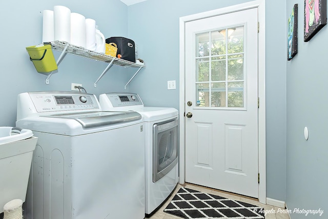 laundry area with washer and clothes dryer