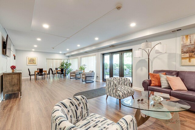 225 Lake Blvd Unit 546, Buffalo Grove, IL 60089 - living area featuring recessed lighting, wood finished floors, and baseboards