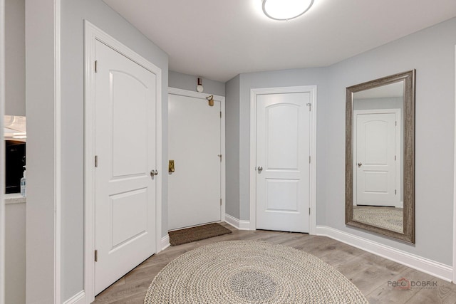 225 Lake Blvd Unit 546, Buffalo Grove, IL 60089 - hall with light wood finished floors and baseboards