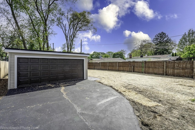 garage featuring fence