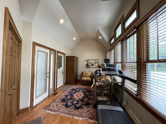 9600 W Shore Dr, Oak Lawn, IL 60453 - exercise room featuring lofted ceiling, light wood-style flooring, recessed lighting, and baseboards