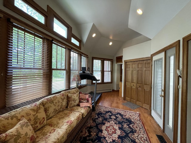 9600 W Shore Dr, Oak Lawn, IL 60453 - living room with recessed lighting, healthy amount of natural light, light wood-type flooring, and vaulted ceiling