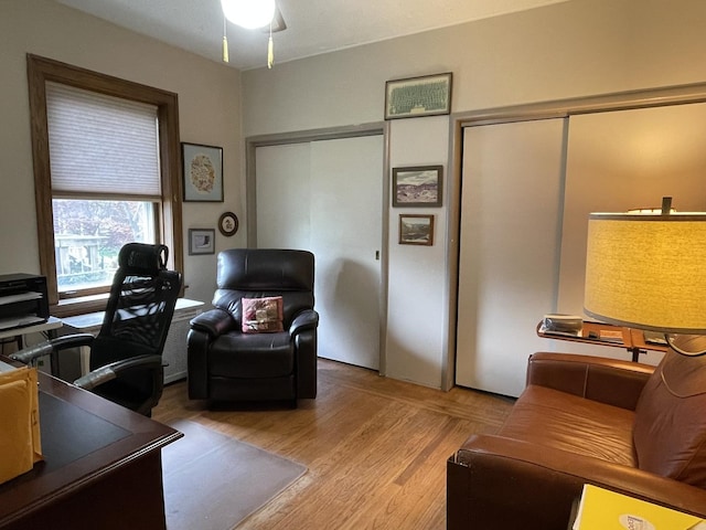 9600 W Shore Dr, Oak Lawn, IL 60453 - home office featuring light wood-style flooring and ceiling fan