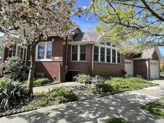 9600 W Shore Dr, Oak Lawn, IL 60453 - view of front of property with brick siding and a garage