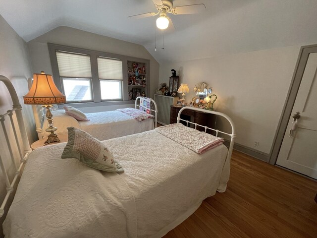 9600 W Shore Dr, Oak Lawn, IL 60453 - bedroom featuring vaulted ceiling, wood finished floors, ceiling fan, and baseboards