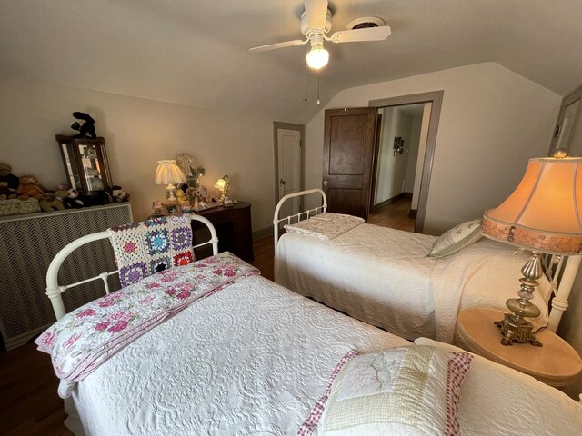 9600 W Shore Dr, Oak Lawn, IL 60453 - bedroom with vaulted ceiling, wood finished floors, and a ceiling fan