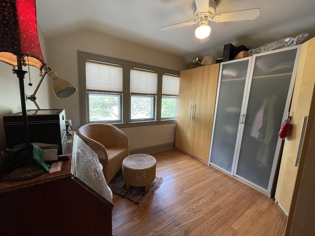 9600 W Shore Dr, Oak Lawn, IL 60453 - living area with light wood-style floors, vaulted ceiling, a ceiling fan, and baseboards