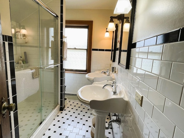 9600 W Shore Dr, Oak Lawn, IL 60453 - full bathroom with a sink, a shower stall, tile patterned floors, tile walls, and wainscoting