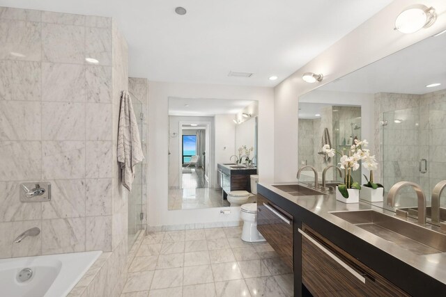 130 N Garland Ct Unit 3803, Chicago, IL 60602 - full bathroom with toilet, a stall shower, double vanity, a bathtub, and marble finish flooring