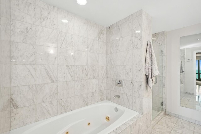130 N Garland Ct Unit 3803, Chicago, IL 60602 - bathroom featuring a stall shower and a jetted tub