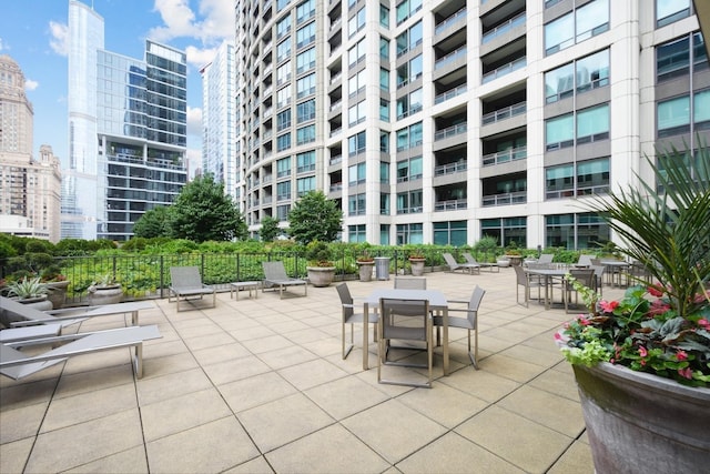 130 N Garland Ct Unit 3803, Chicago, IL 60602 - view of patio with a city view and fence